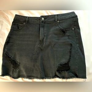 Cute black ripped skirt. Size large.